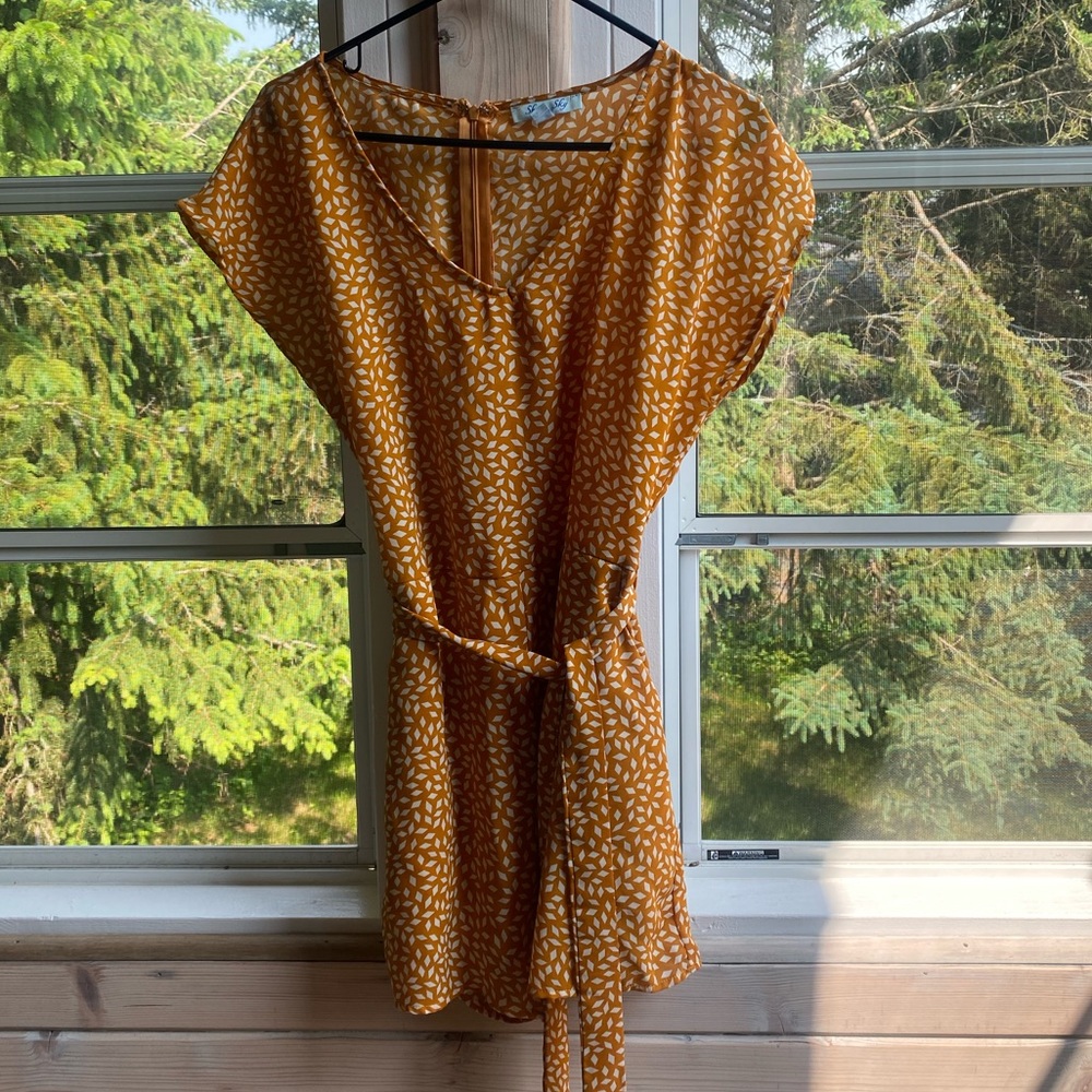 Cute mustard romper, worn only once or twice!
